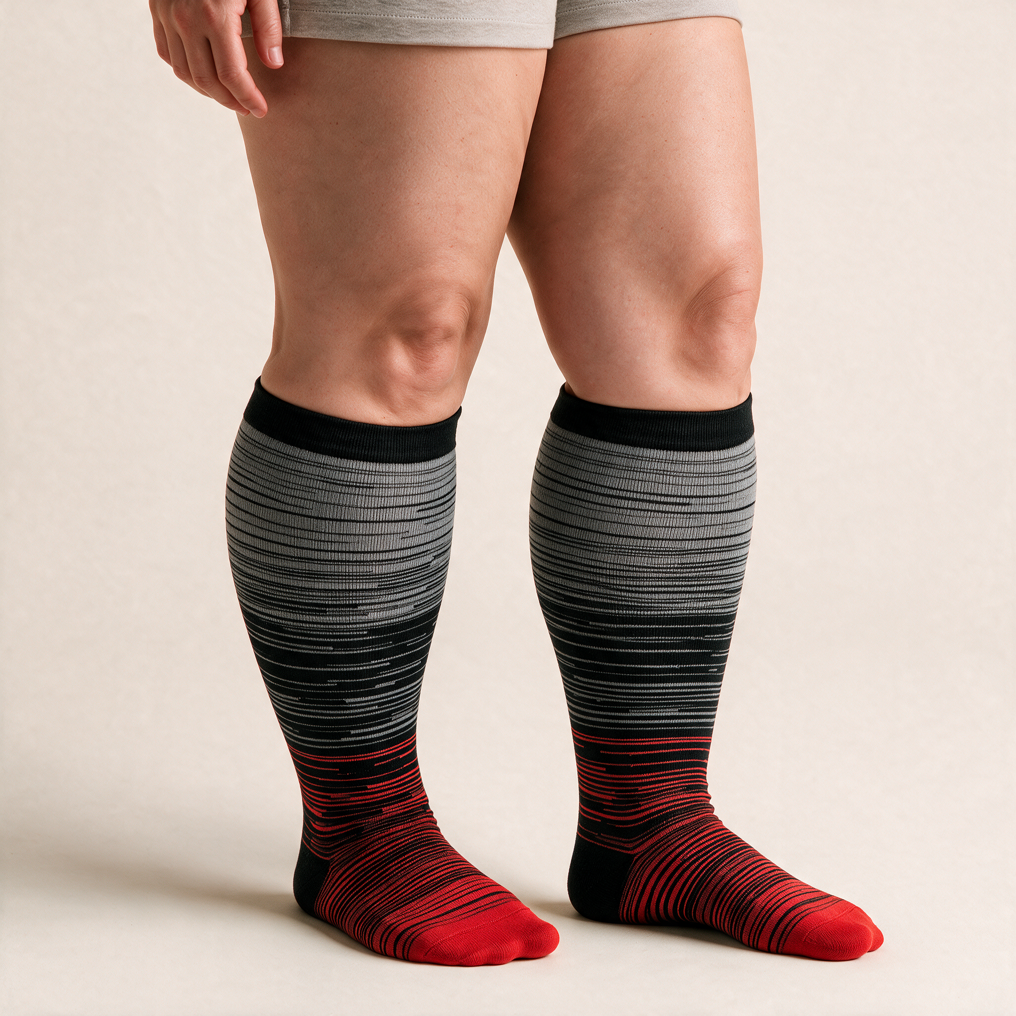 Clinical Compression – Wide Calf: Ash to Ember compression sock worn on model