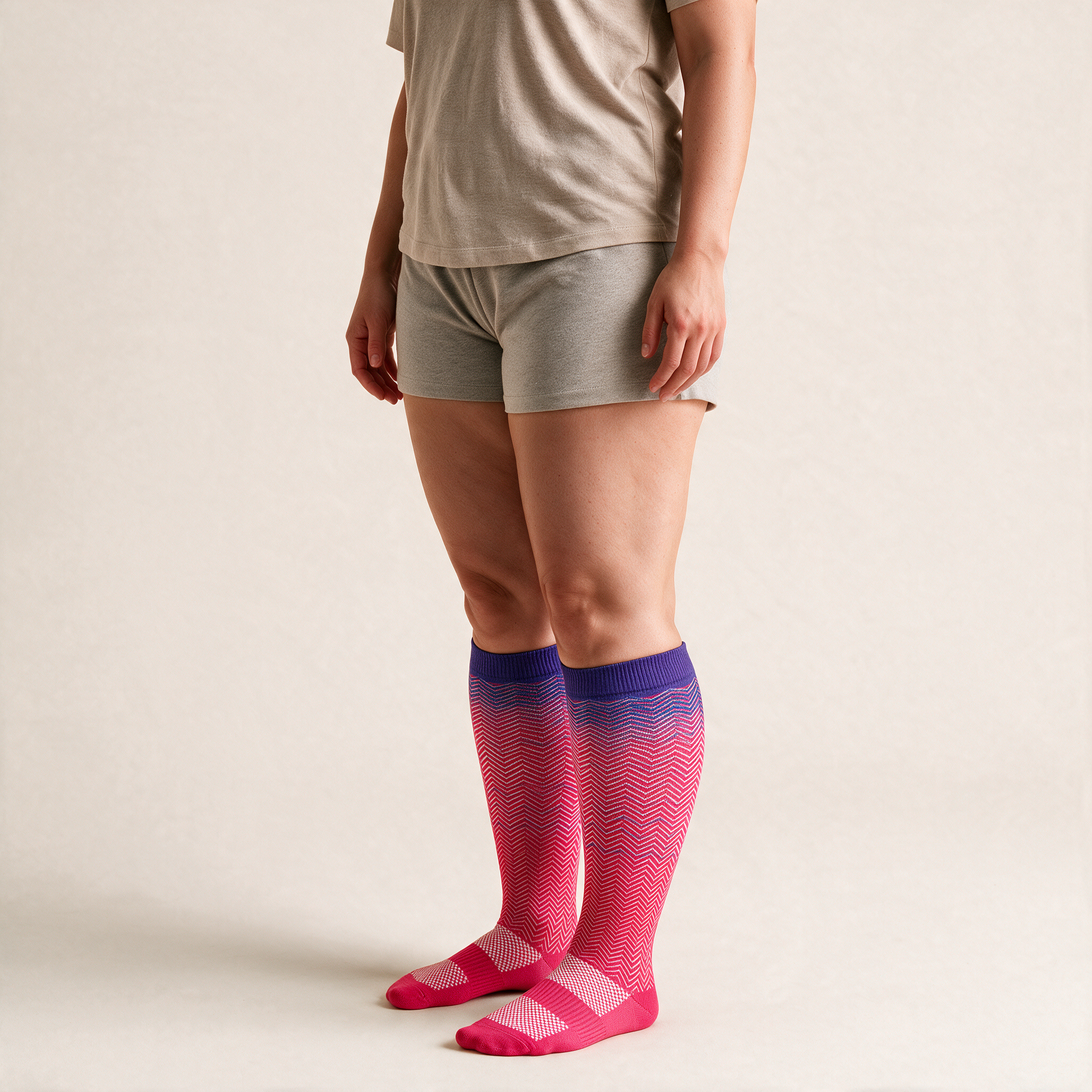 Clinical Compression – Wide Calf: Magenta Fade compression sock worn on model