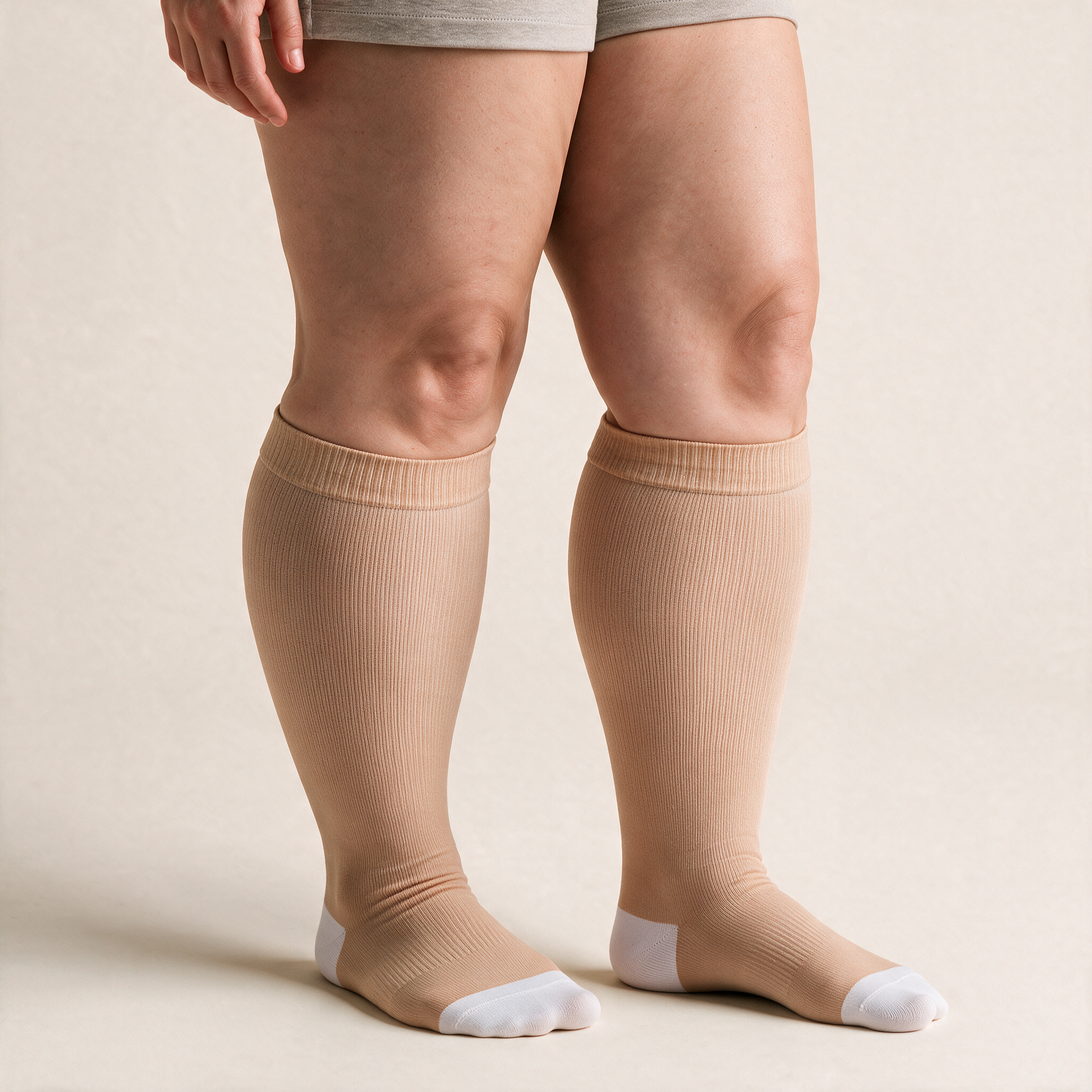 Clinical Compression – Wide Calf: Nude Blush compression sock worn on model